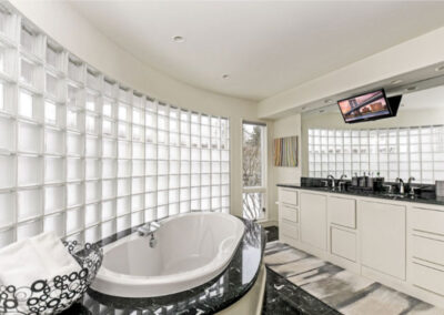 Glass Block Bathroom Windows - Photo of a beautiful panoramic glass block window in a modern bathroom.