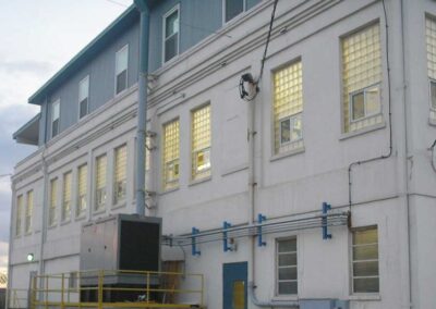 Commercial Glass Block Window Project - Photo of a commercial building that had all window replaced with gold color glass blocks.