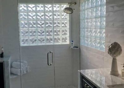 Glass Block Bathroom Windows - Photo of two glass block windows in a bathroom shower.