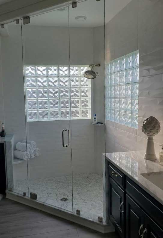 Glass Block Bathroom Windows - Photo of two glass block windows in a bathroom shower.